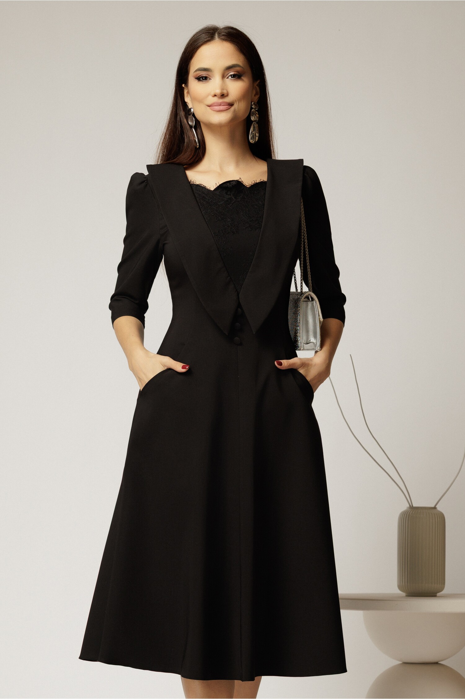 Rochie midi neagra de ocazie cu insertii din dantela la bust si buzunare